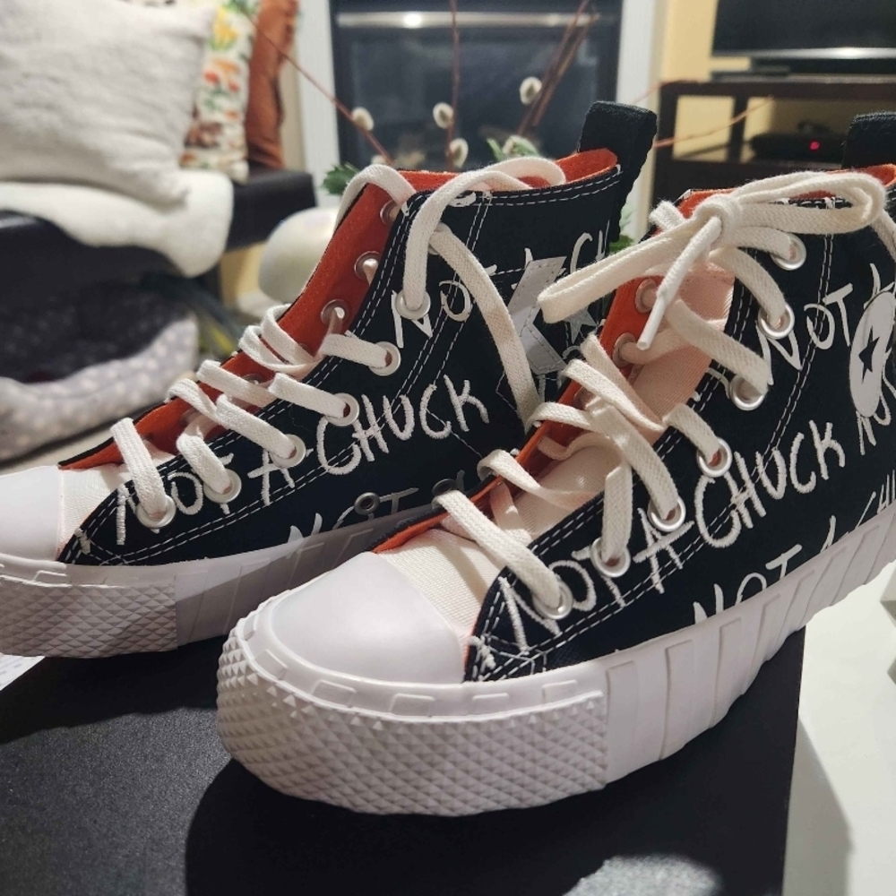 Converse Black and White High-Top Sneakers